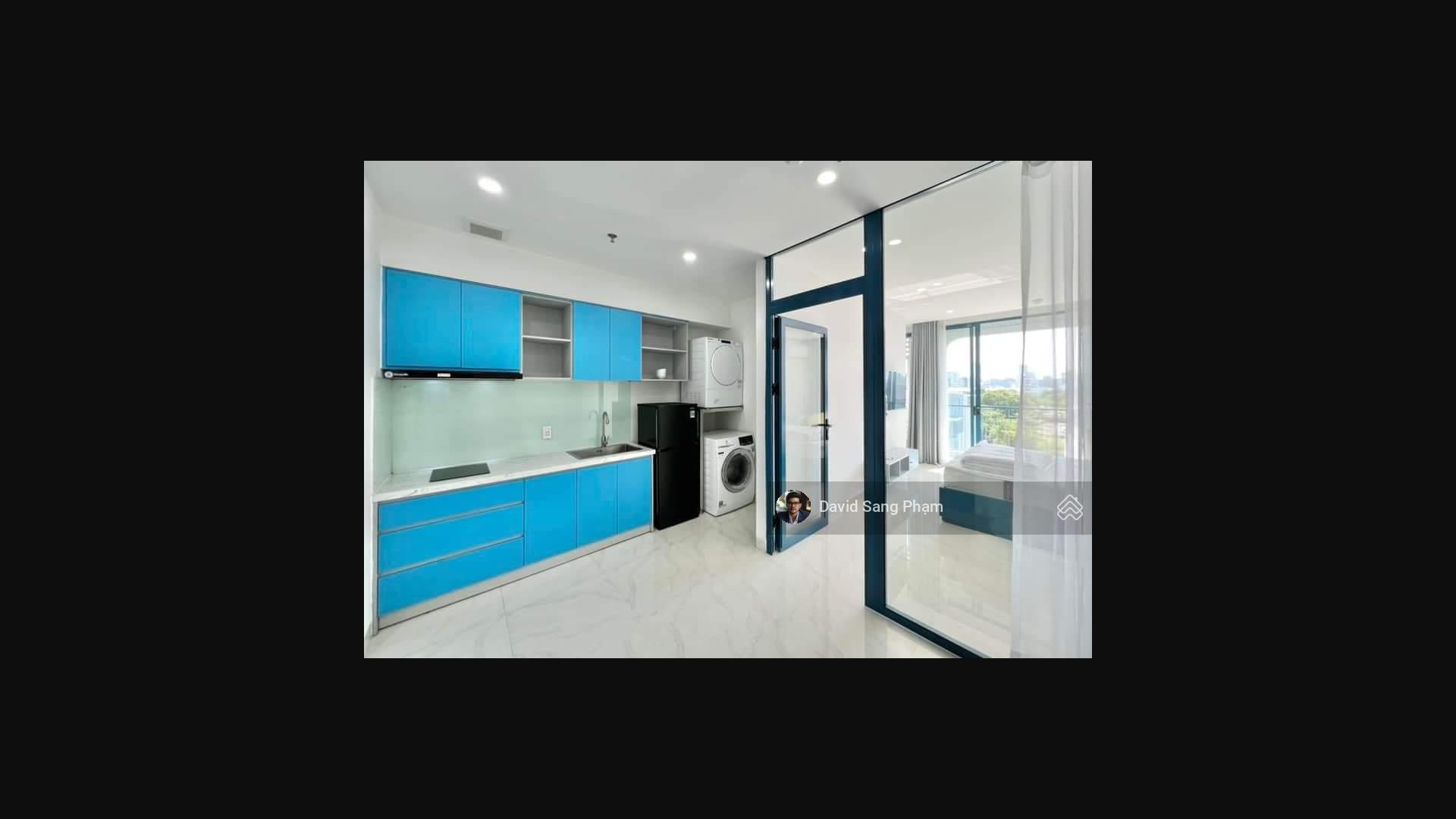 Modern Studio with Blue Accents and City View