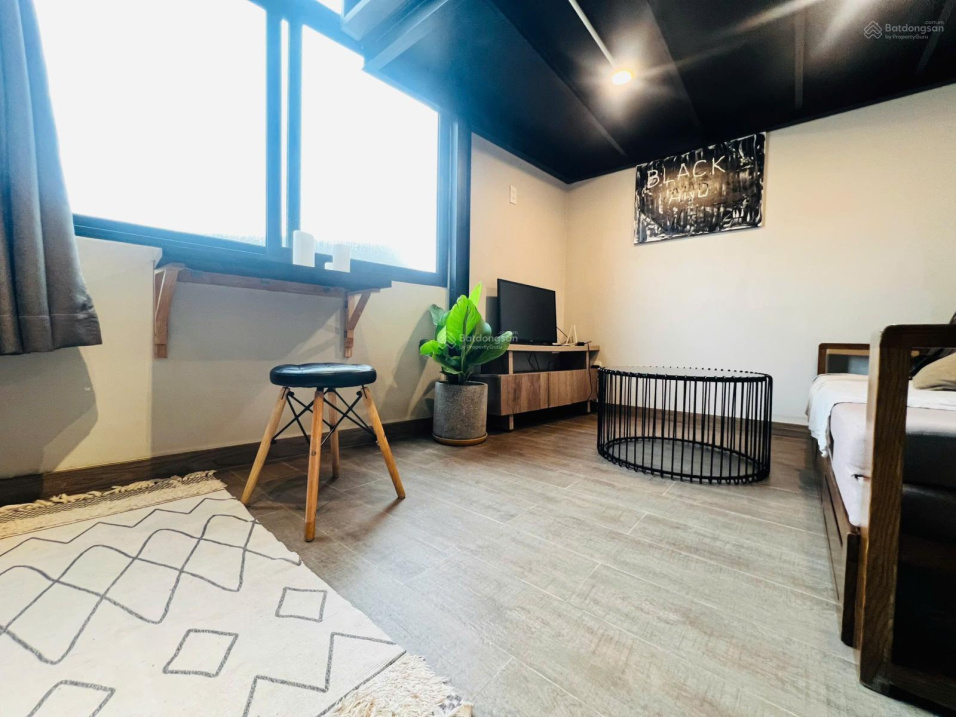 Modern Studio Apartment with Balcony View