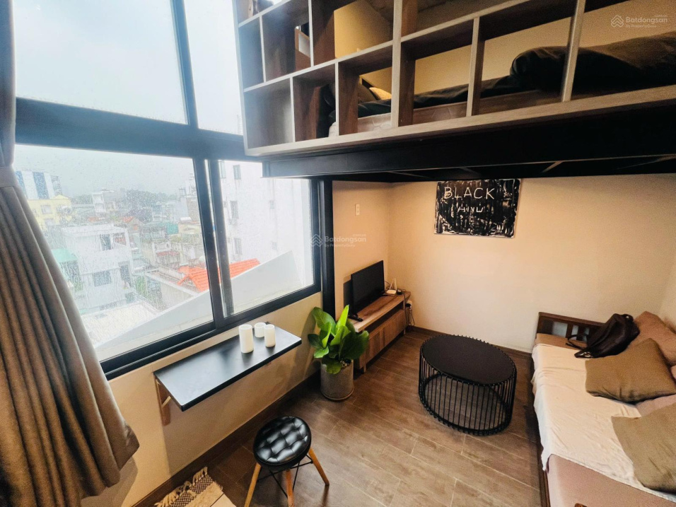 Modern Studio Apartment with Balcony View