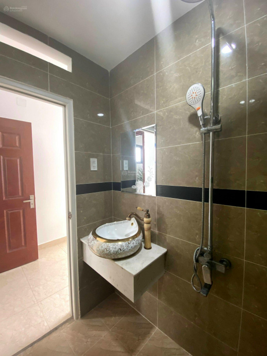 Furnished Room with Modern Bathroom and Built-in Storage