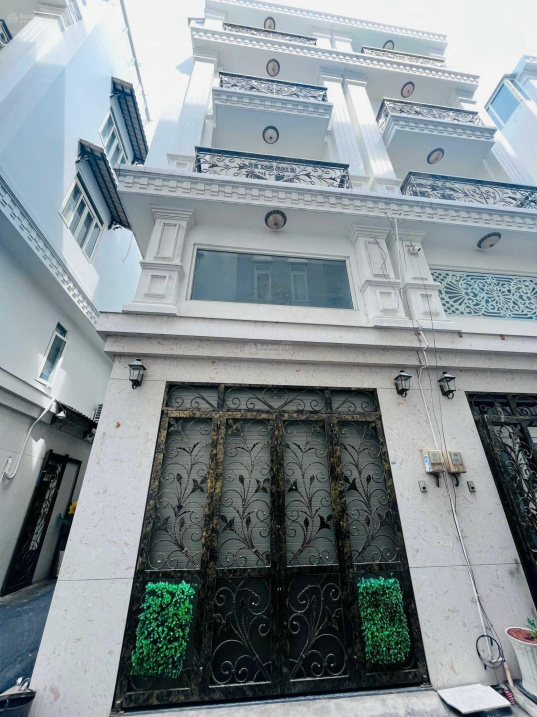 Newly renovated house near Phuc Long, Phan Xich Long Street