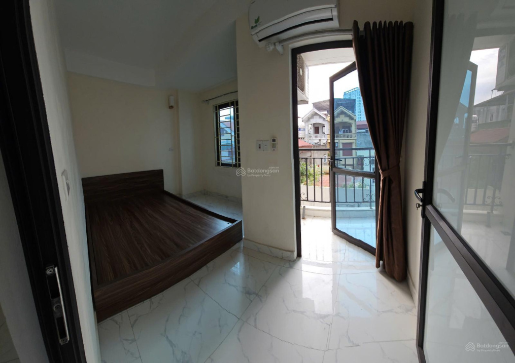 Modern Studio Apartment with Balcony and City Views