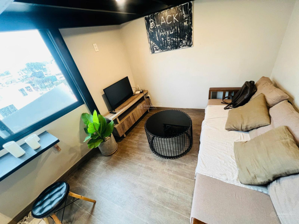 Modern Studio Apartment with Balcony View