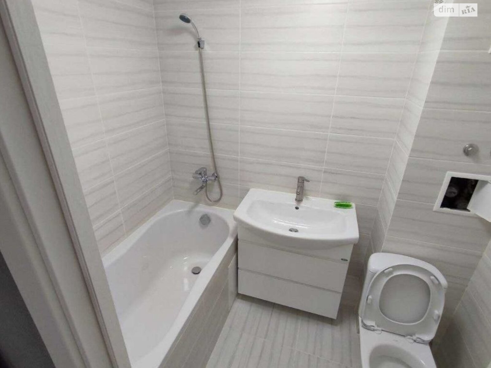 Bright two-room apartment with classic layout, balcony, and quality renovation