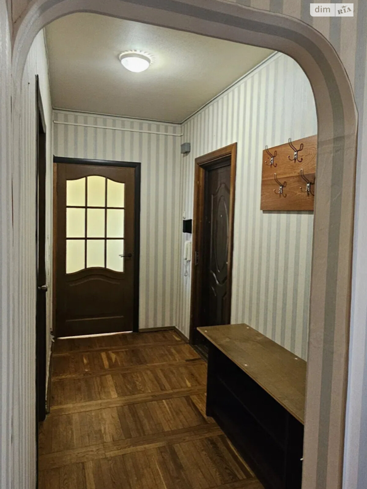 Two-room apartment with separate rooms, parquet floors, and balcony