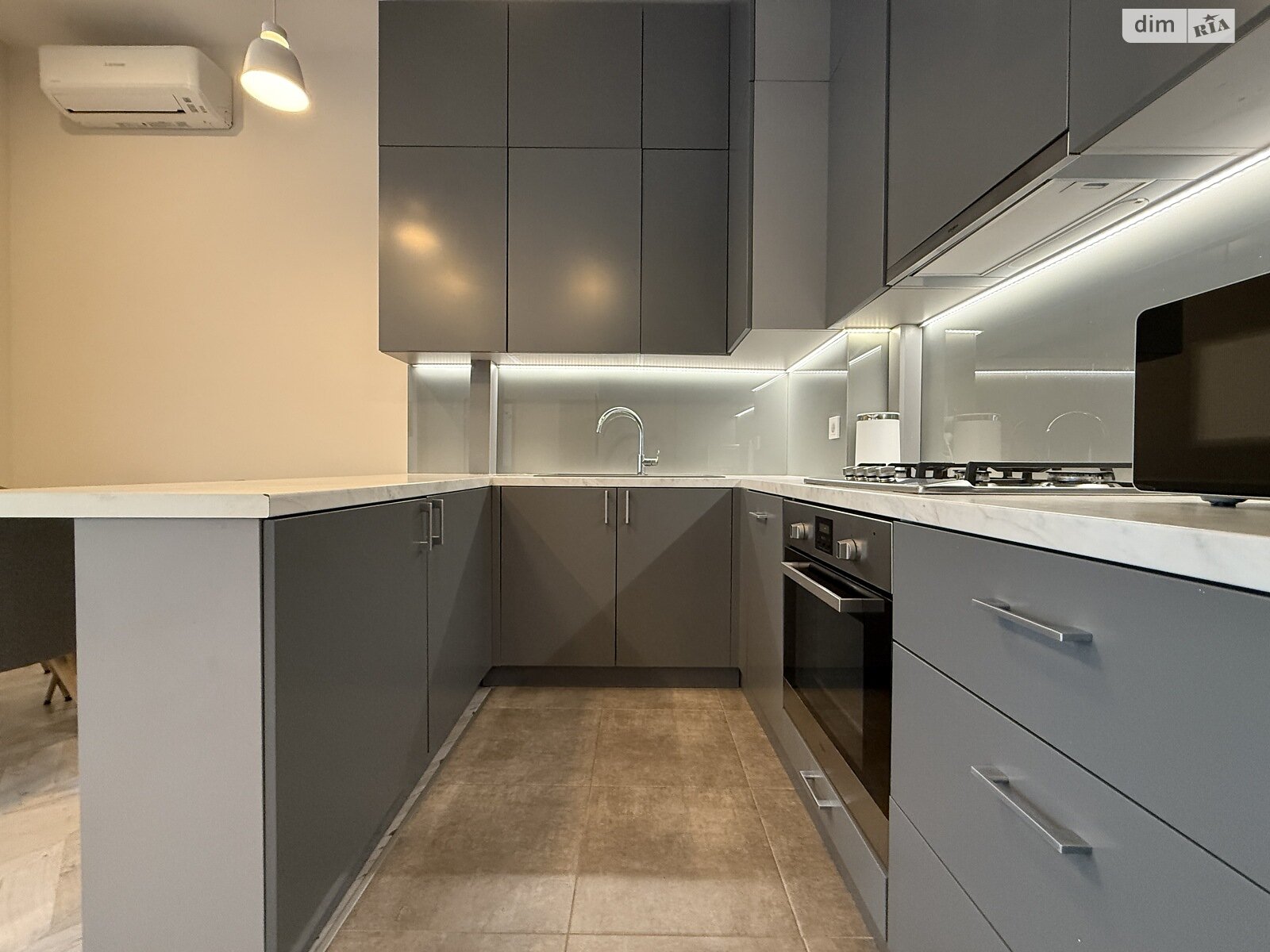 1-Bedroom Apartment with Studio Kitchen in Elite Forum Apartment Complex