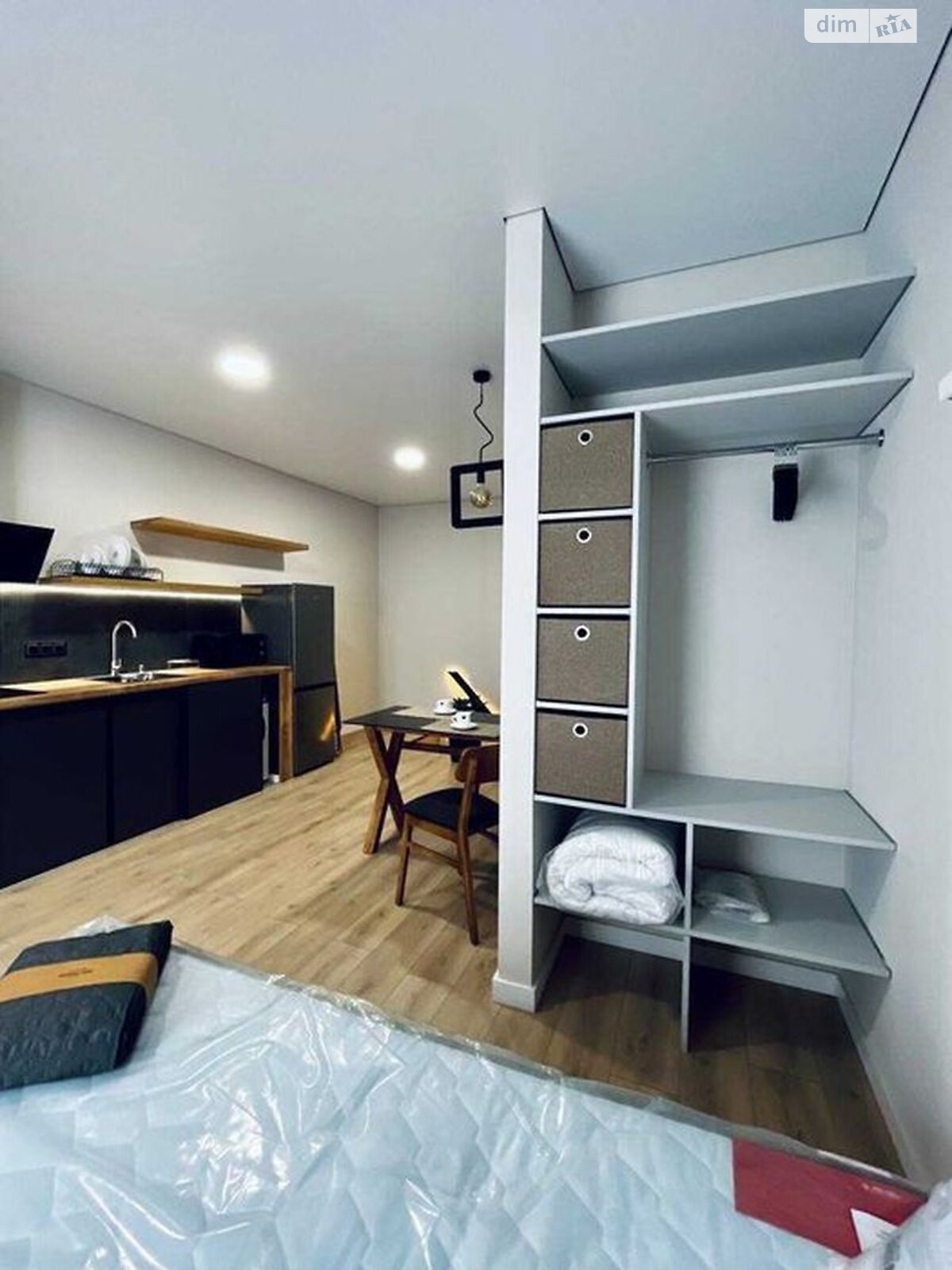 Modern Compact Studio Apartment with Smart Storage Solutions