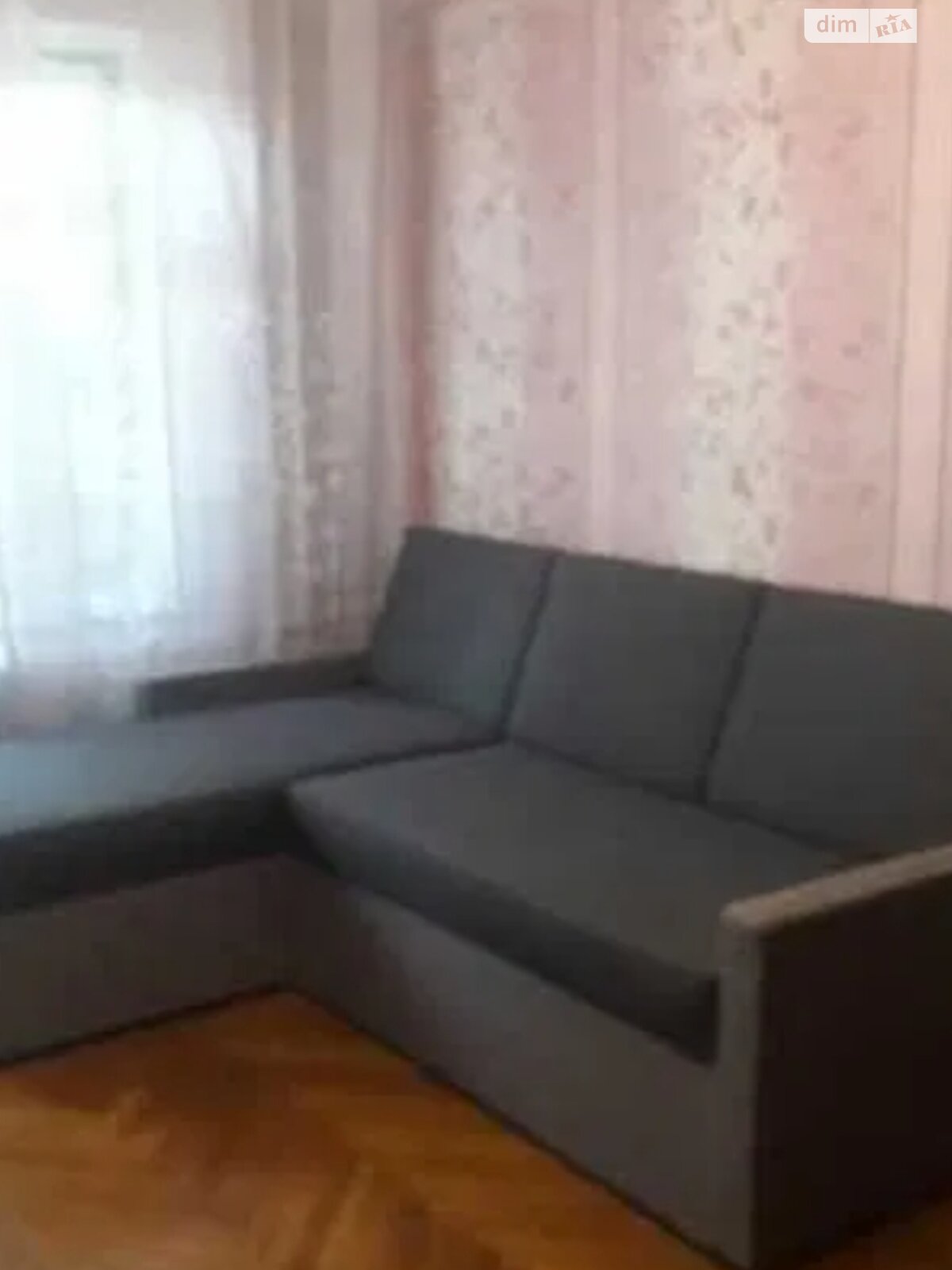 Apartment on Vasylkivska Street with Parquet Floors and Corner Sofa