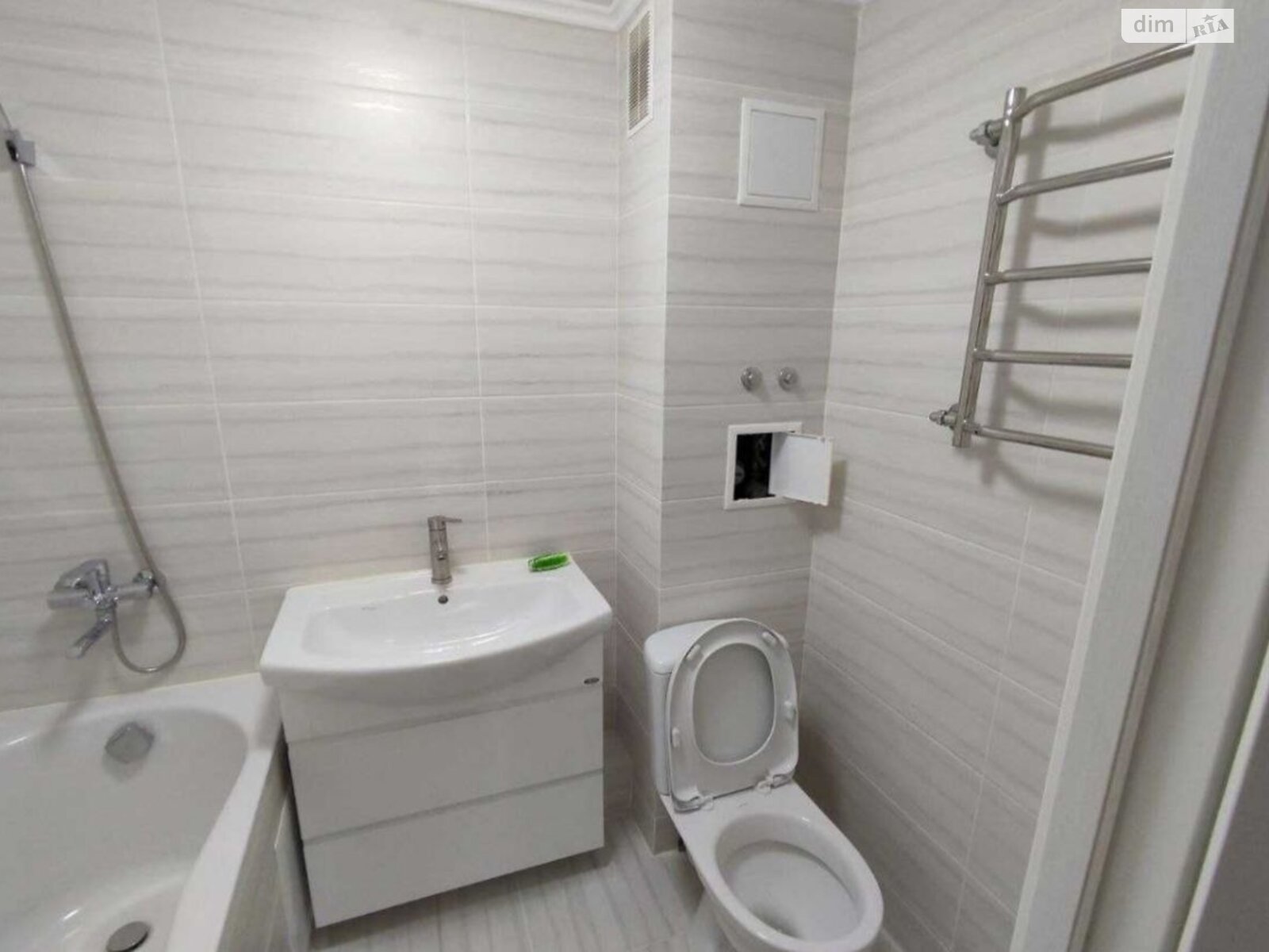Bright two-room apartment with classic layout, balcony, and quality renovation