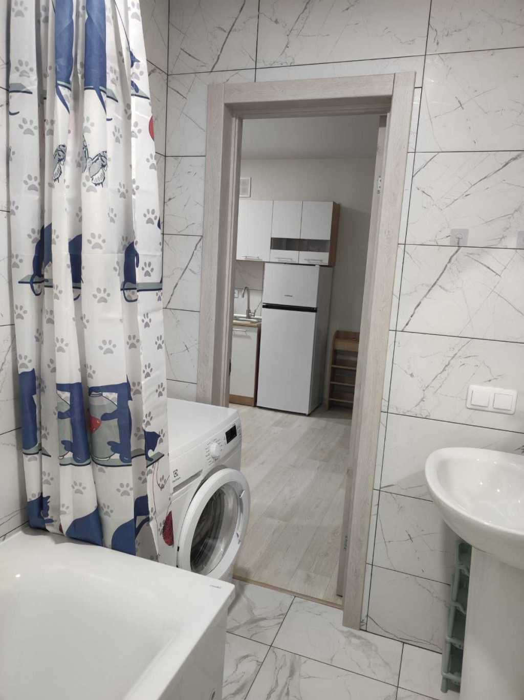 Compact Apartment in AURA Complex with Gas Heating, WiFi, and Modern Amenities