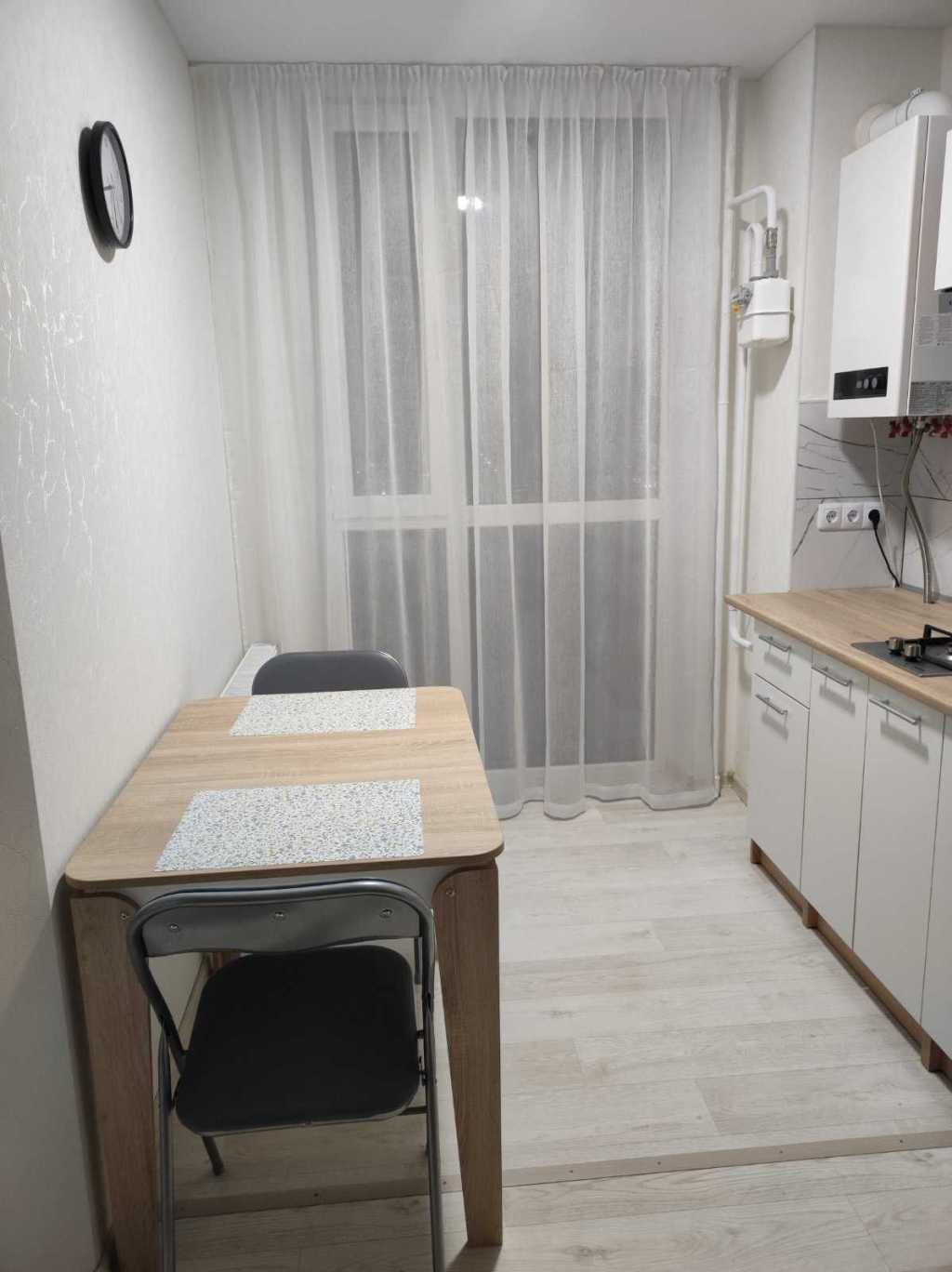 Compact Apartment in AURA Complex with Gas Heating, WiFi, and Modern Amenities