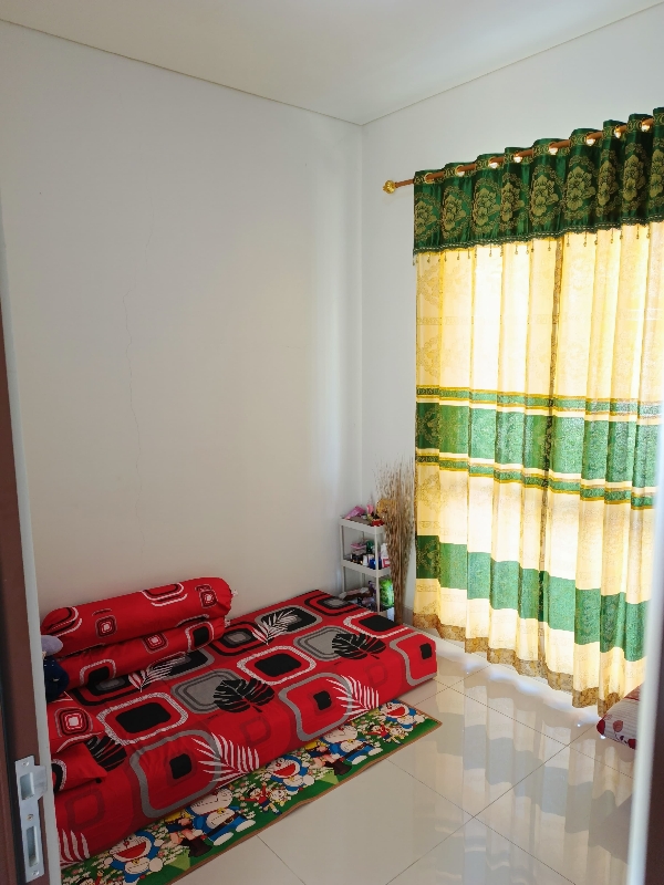 Semi-Furnished 2-Bedroom House with AC in Citra Raya