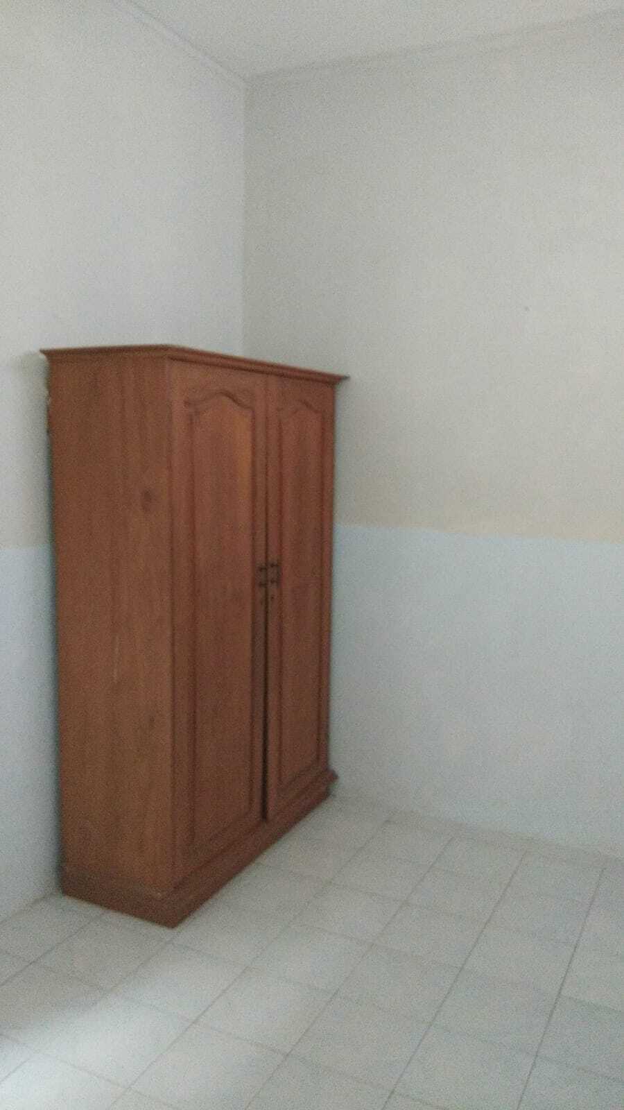 Spacious 7-Bedroom House Near Kenjeran with Garage