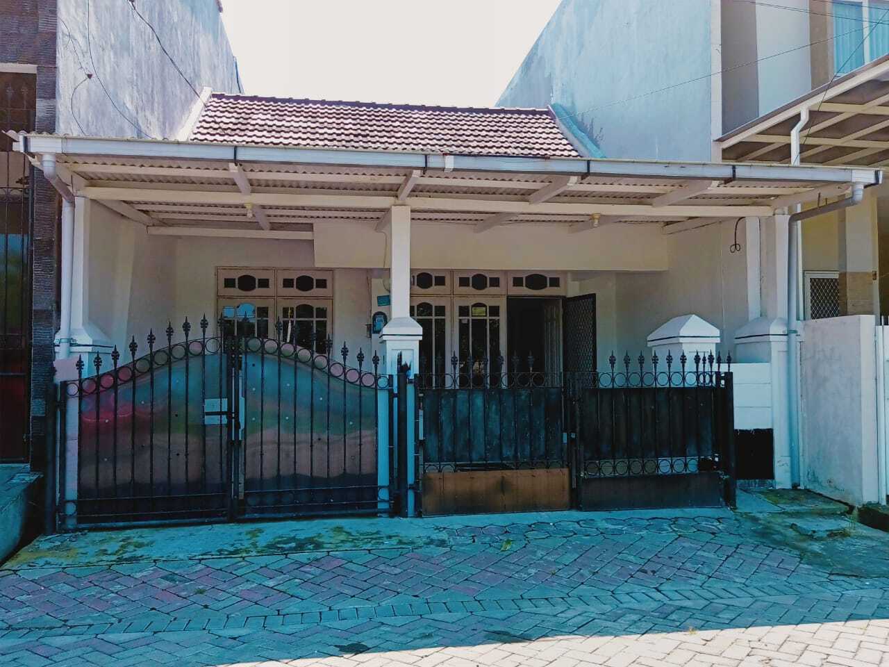 Compact 3-Bedroom House with Covered Parking