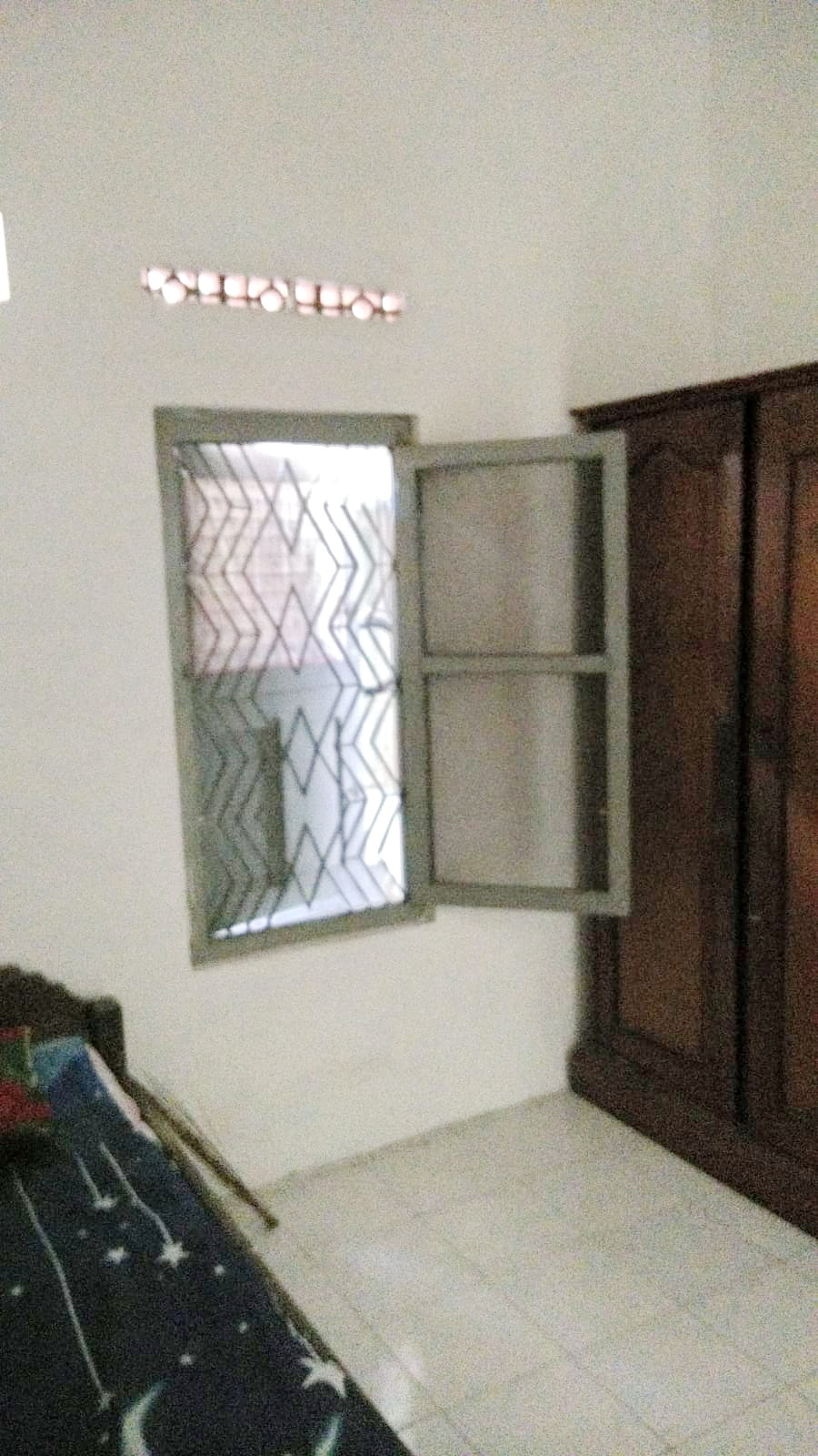 Spacious 7-Bedroom House Near Kenjeran with Garage