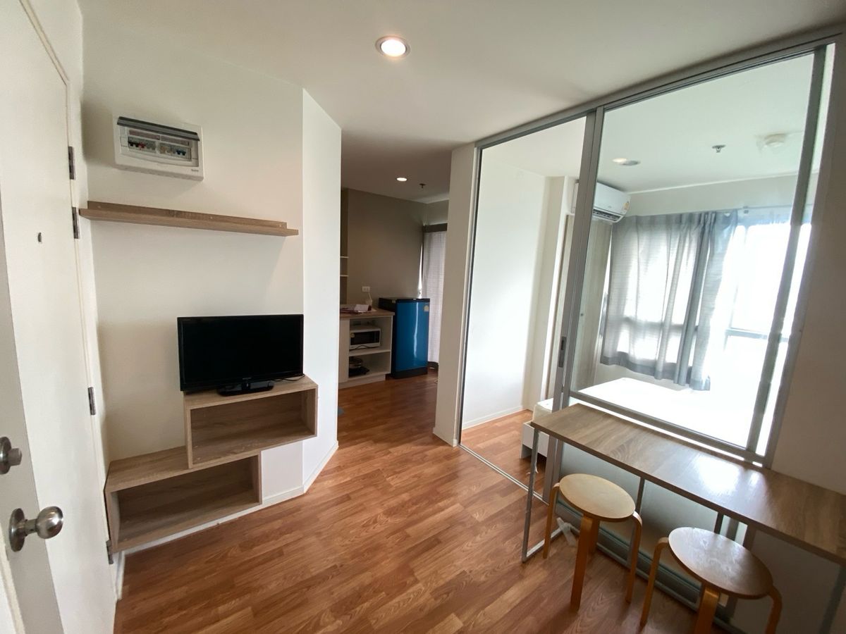 Compact Studio Apartment with Balcony and City View