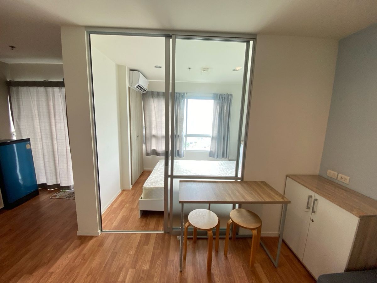 Compact Studio Apartment with Balcony and City View