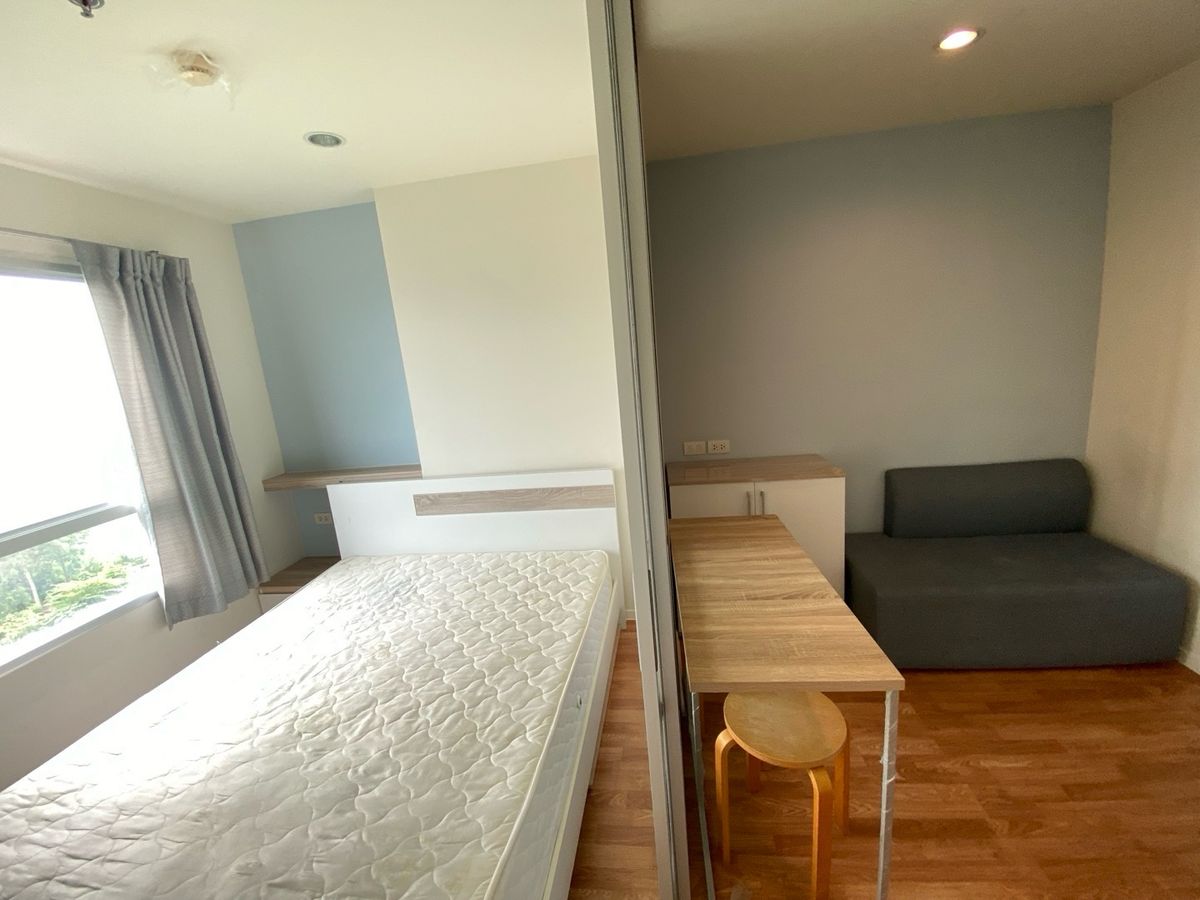 Compact Studio Apartment with Balcony and City View