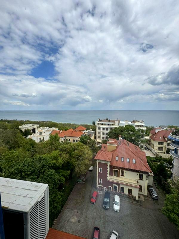 Spacious 3-Level Apartment with Sea View in Prime Location