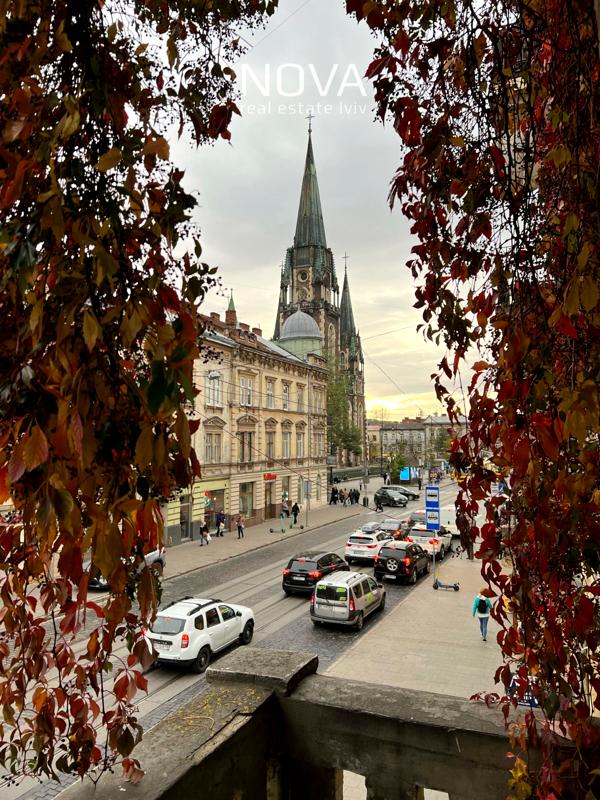Designer 3-room apartment in historic building with incredible view