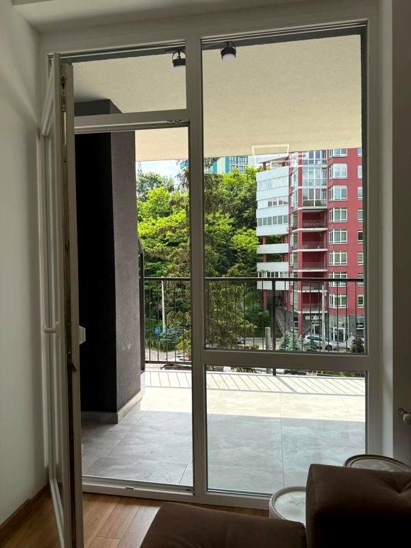 Two-bedroom apartment in new business-class building near Ukraine Stadium