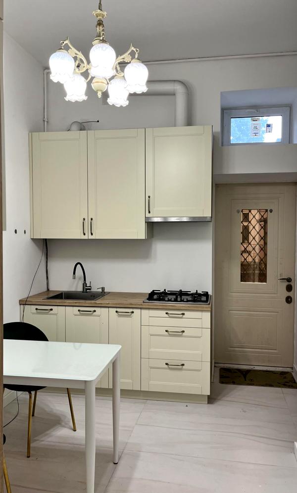 Two-room apartment with high ceilings, gas heating, and balconies