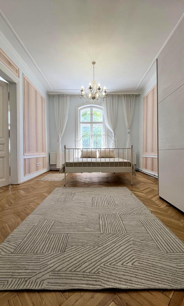 Two-room apartment with high ceilings, gas heating, and balconies