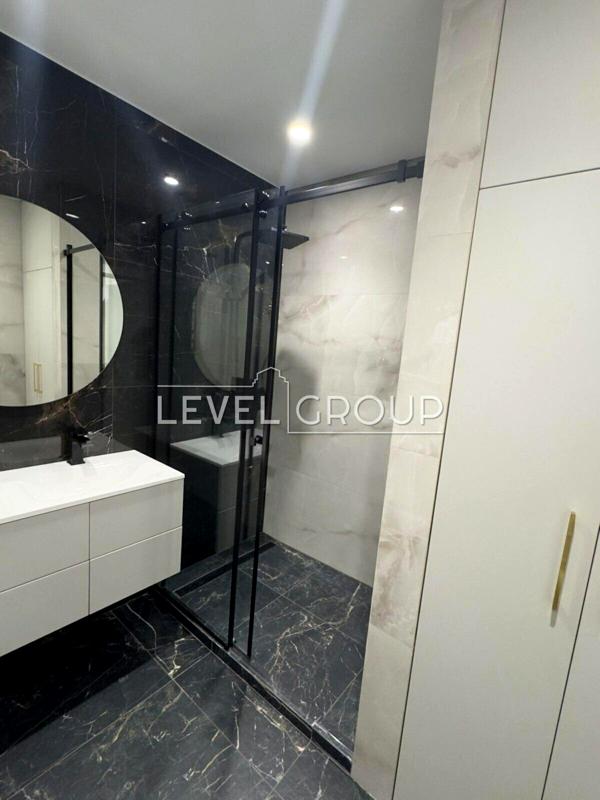 Cozy 1-bedroom studio apartment in Podil Plaza & Residence with panoramic city view