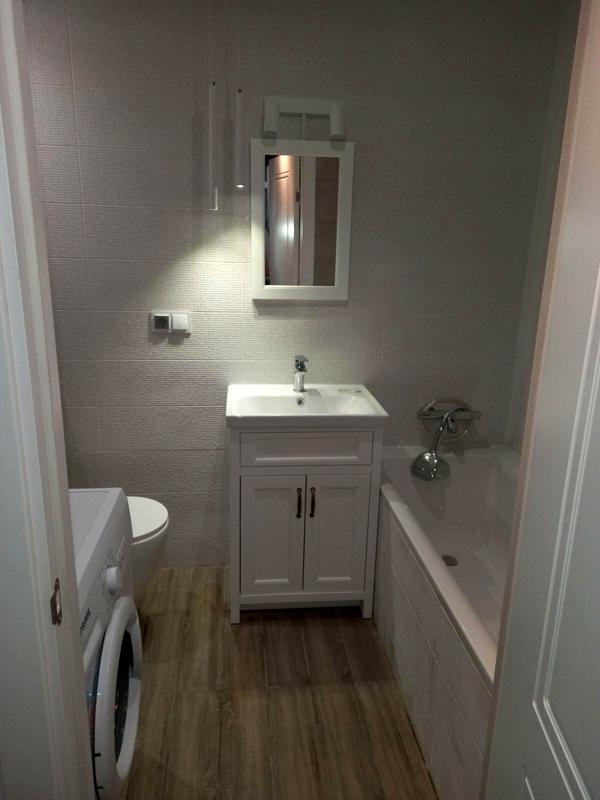 Modern Compact Apartment with Designer Interior