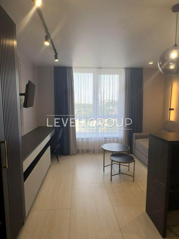 Cozy 1-bedroom studio apartment in Podil Plaza & Residence with panoramic city view
