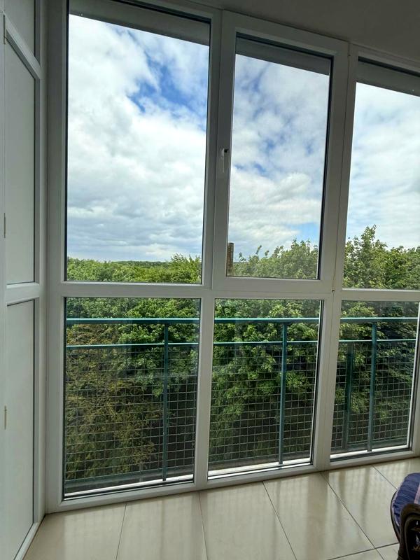 2-Bedroom Apartment with Park View on Zhasminova Street