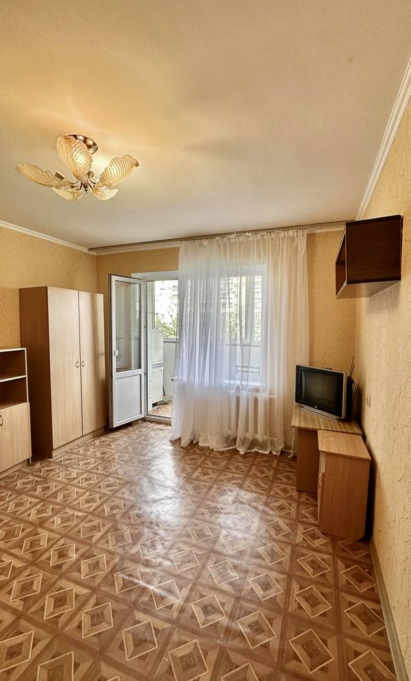 1-Bedroom Apartment near Retroville Mall, Equipped with Furniture and Appliances