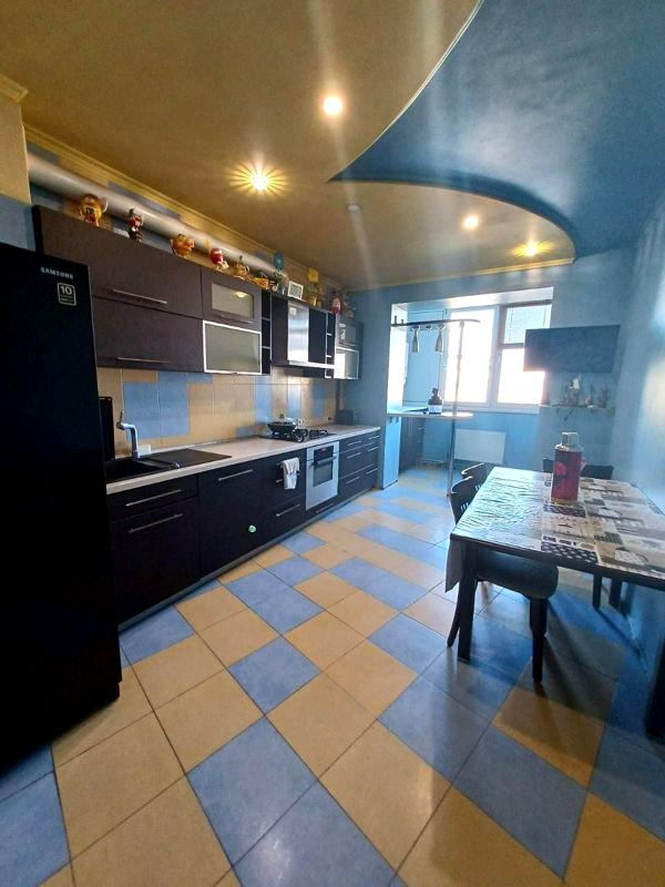 Three-room apartment in new building with designer renovation