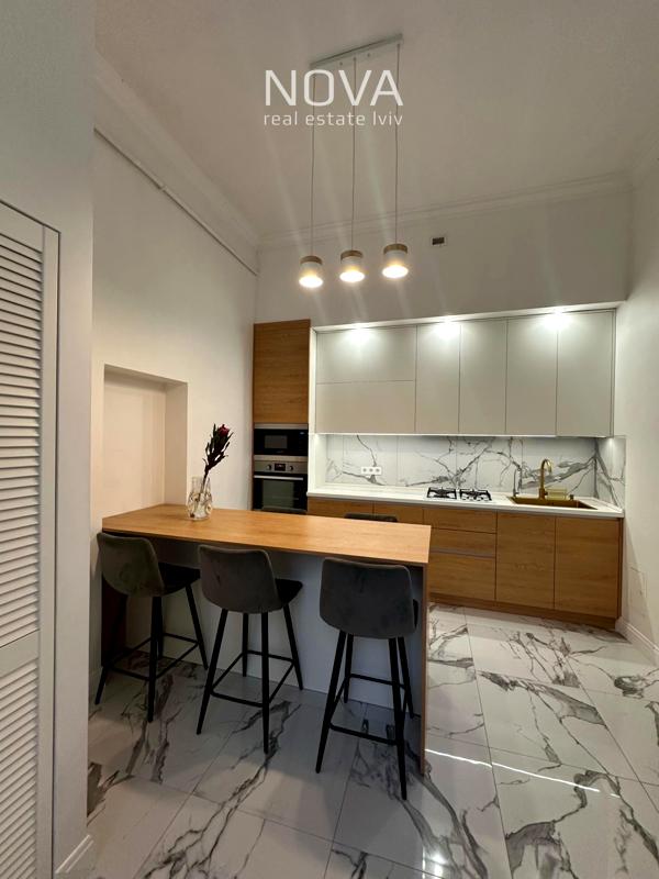 Designer 3-room apartment in historic building with incredible view