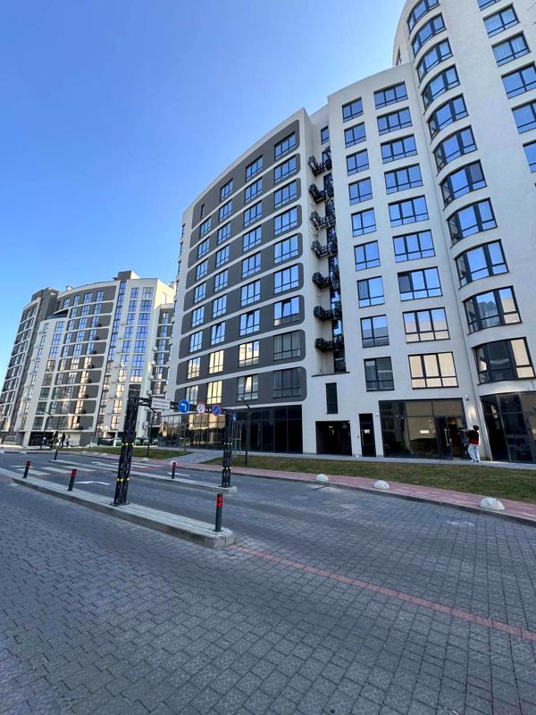 Modern 1-room apartment with studio kitchen in Parус City complex