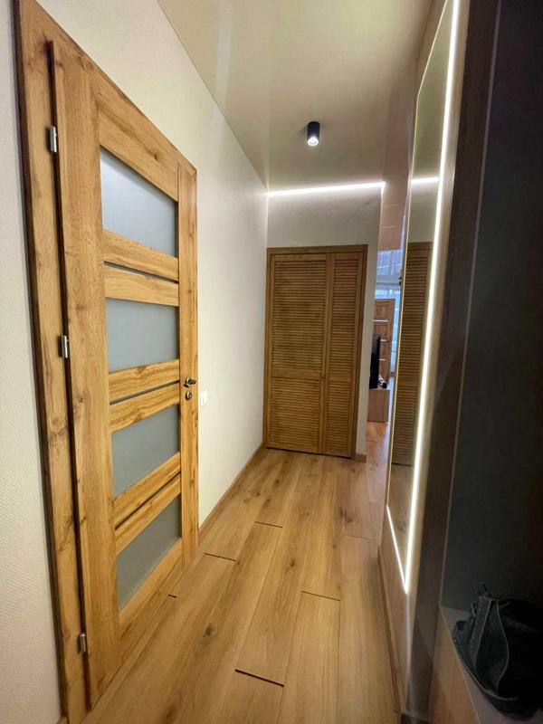 Spacious 1-bedroom apartment in Parus City with modern renovation and full equipment