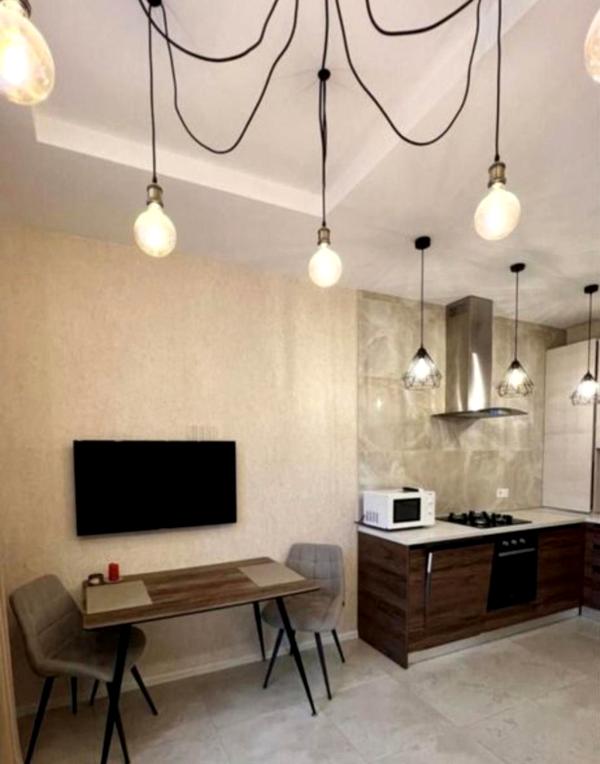 Spacious 1-room apartment near Arcadia and sea with underground parking