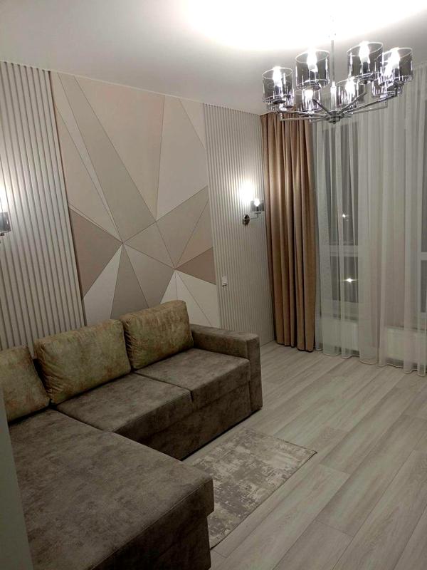 Modern 1-room apartment with studio kitchen in Parус City complex