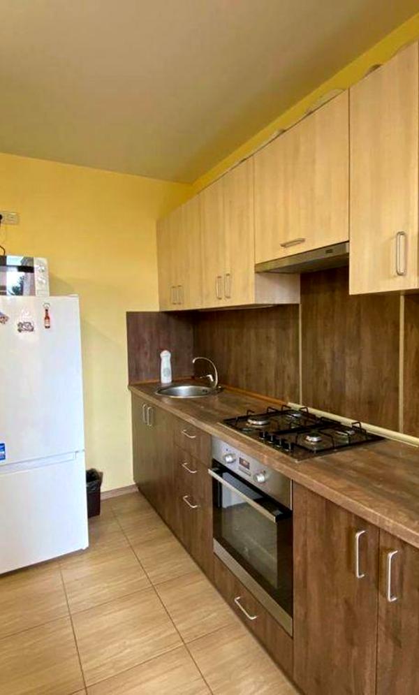 1-bedroom apartment with modern interior, parking, and amenities