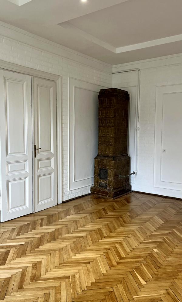 Two-room apartment with high ceilings, gas heating, and balconies