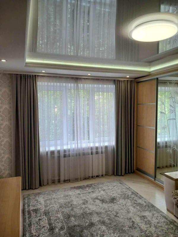 Spacious 2-room apartment near Golosiyivsky Park with designer renovation