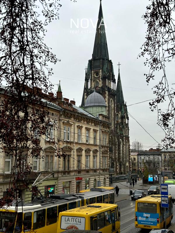 Designer 3-room apartment in historic building with incredible view
