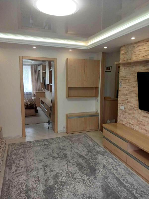Spacious 2-room apartment near Golosiyivsky Park with designer renovation