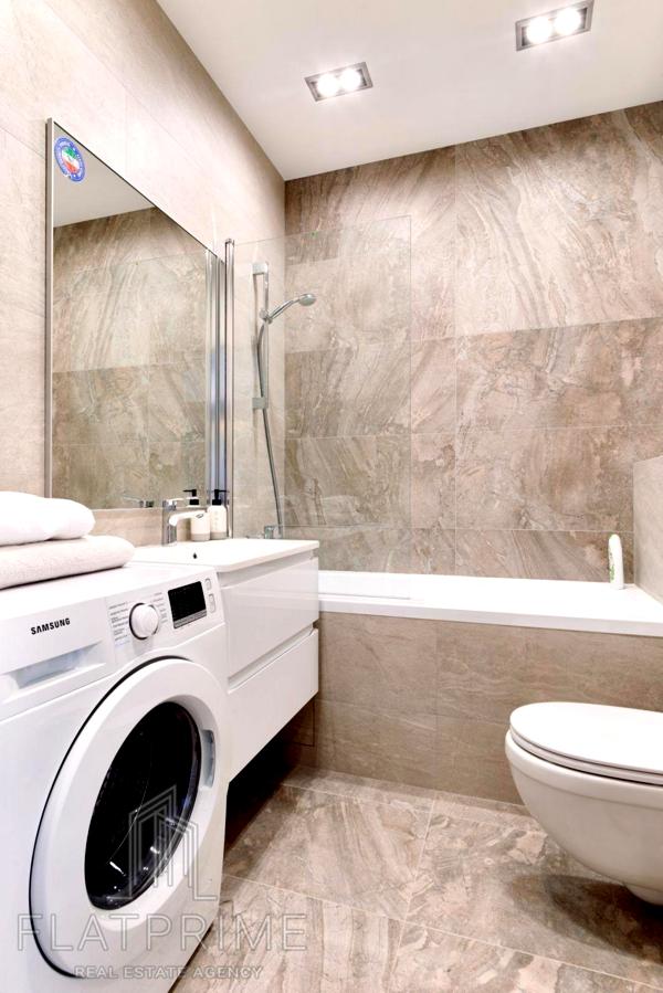 Designer Renovated One-Bedroom Apartment with Wardrobe in PARKLAND Complex