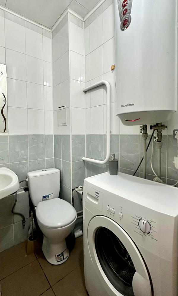 1-Bedroom Apartment near Retroville Mall, Equipped with Furniture and Appliances