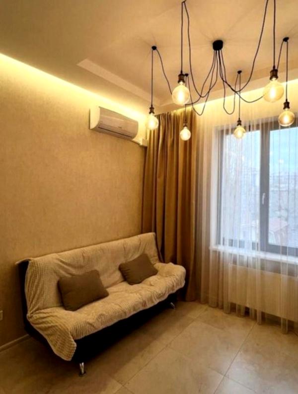Spacious 1-room apartment near Arcadia and sea with underground parking