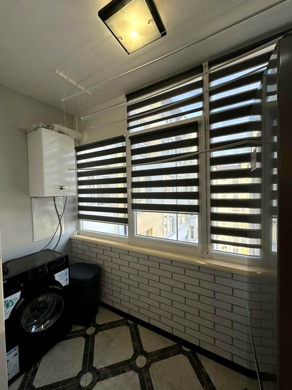2-Room Apartment on Dovzhenka Street with Modern Design and Amenities