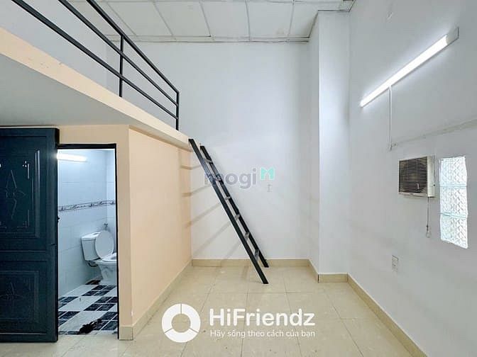 Compact Loft-Style Room with Mezzanine and Modern Amenities