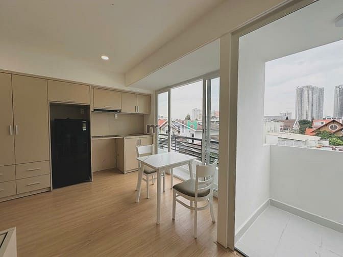 High-End Furnished Studio Apartment with Balcony and City View