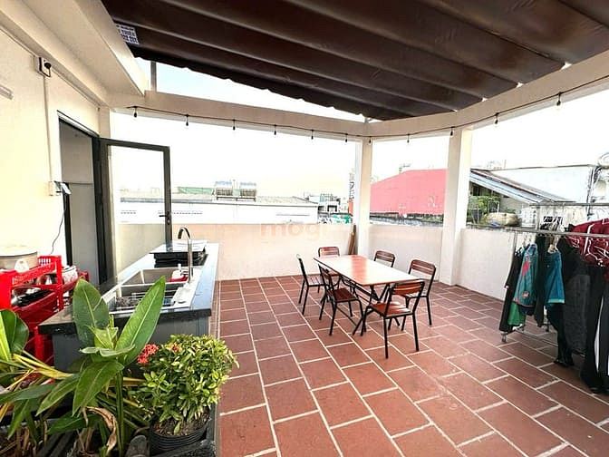 Modern Dormitory with Shared Kitchen and Rooftop
